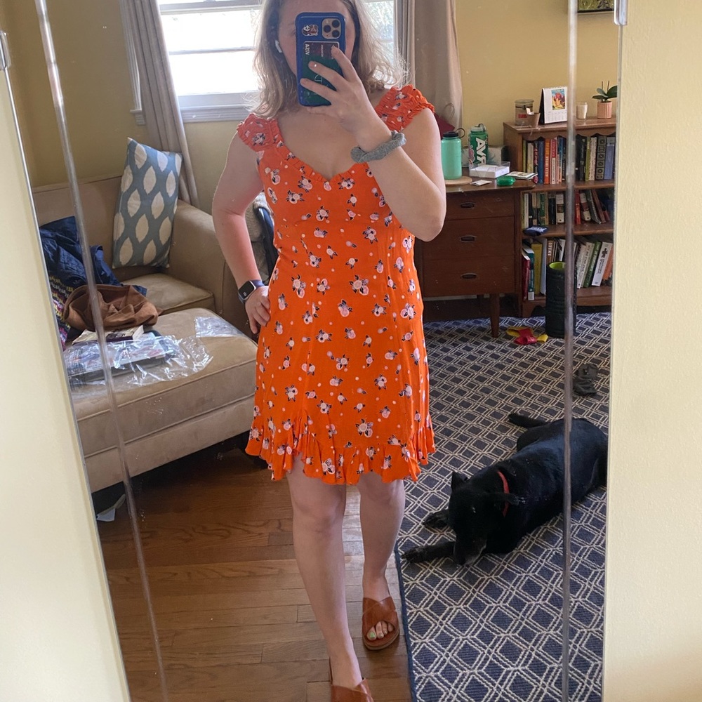 Orange sundress with oranges on it